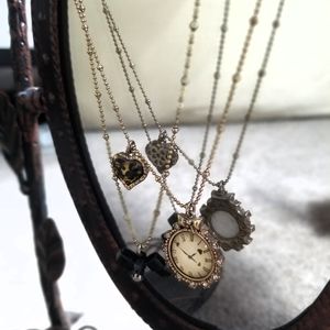 Betsy Johnson gold layered charm necklace